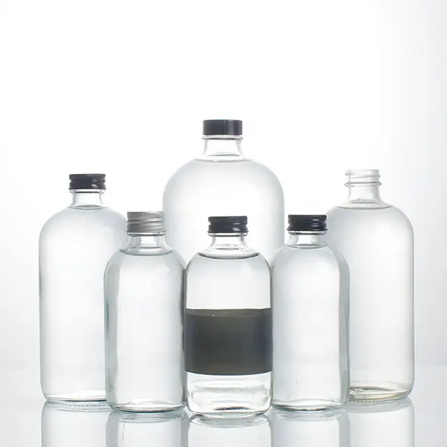 Boston round flint glass beverage bottle, 250–500 ml